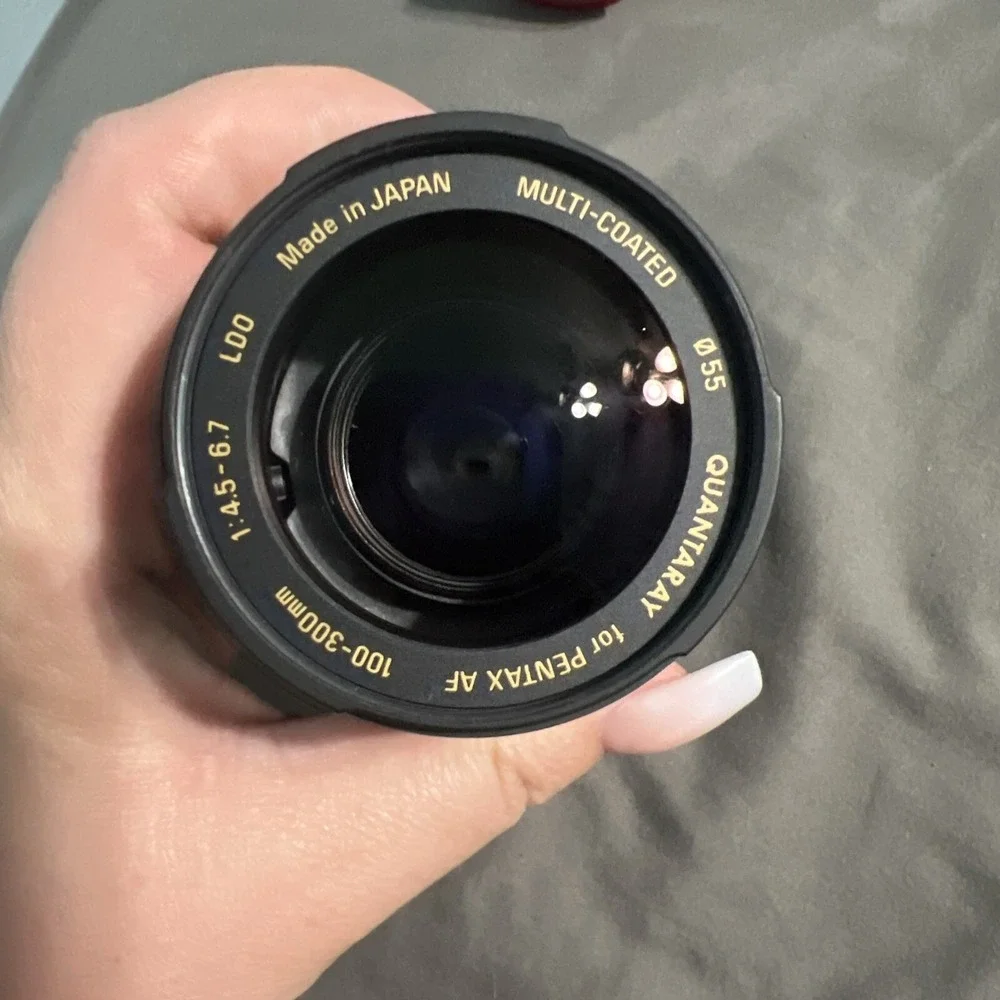 Quantaray 100-300mm 1:4.5-6.7 Autofocus Zoom for Pentax AF Lens W/ 55mm UV Lens